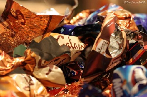 Workers assessing rubbish removal risks inside a flat